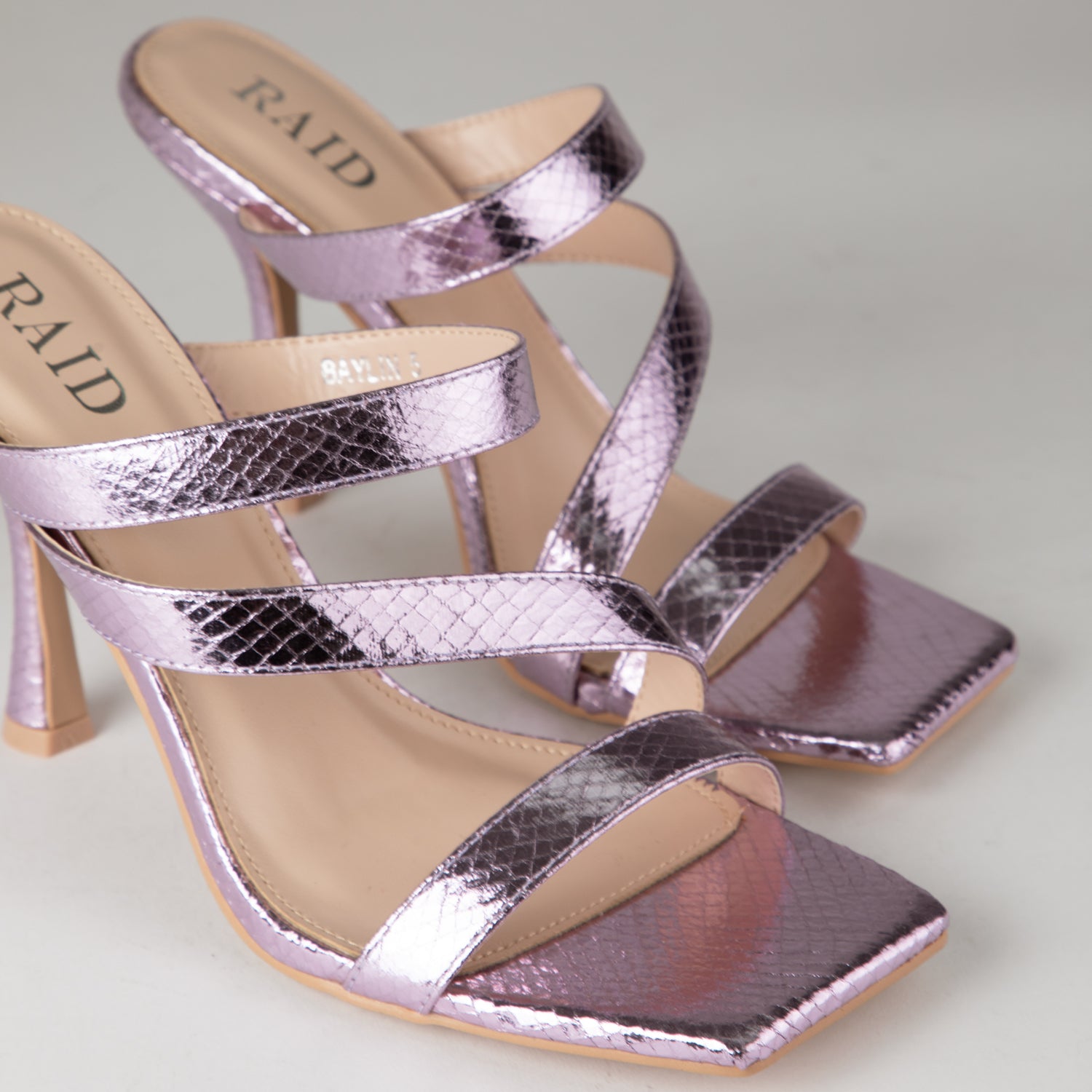 RAID Baylin Heeled Mules in Lilac Snake