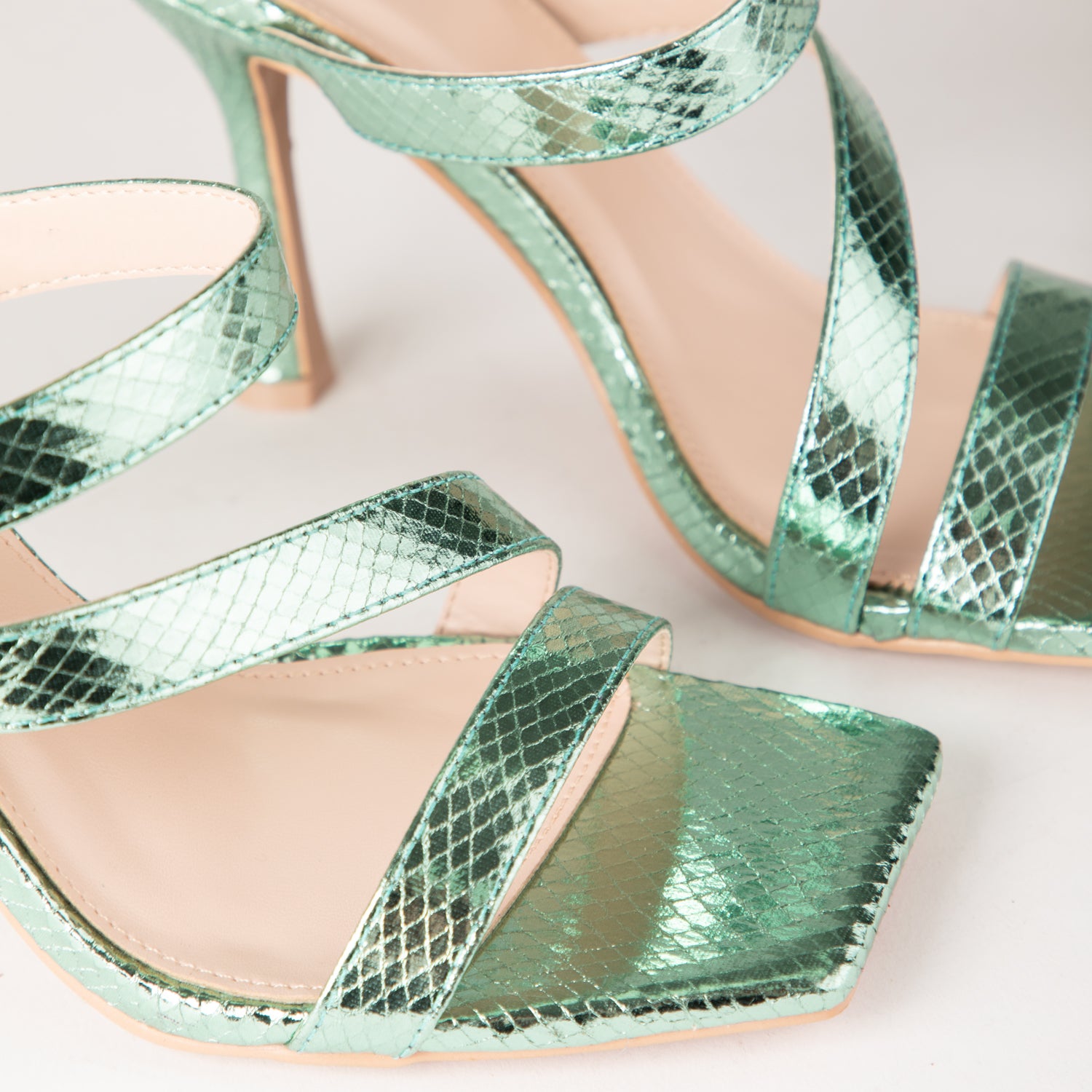 RAID Baylin Heeled Mules in Green Snake