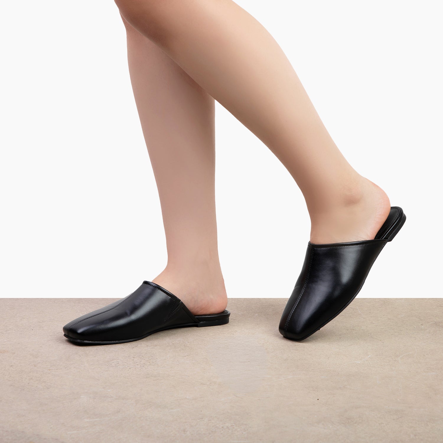 RAID Delta Slip On Mules in Black