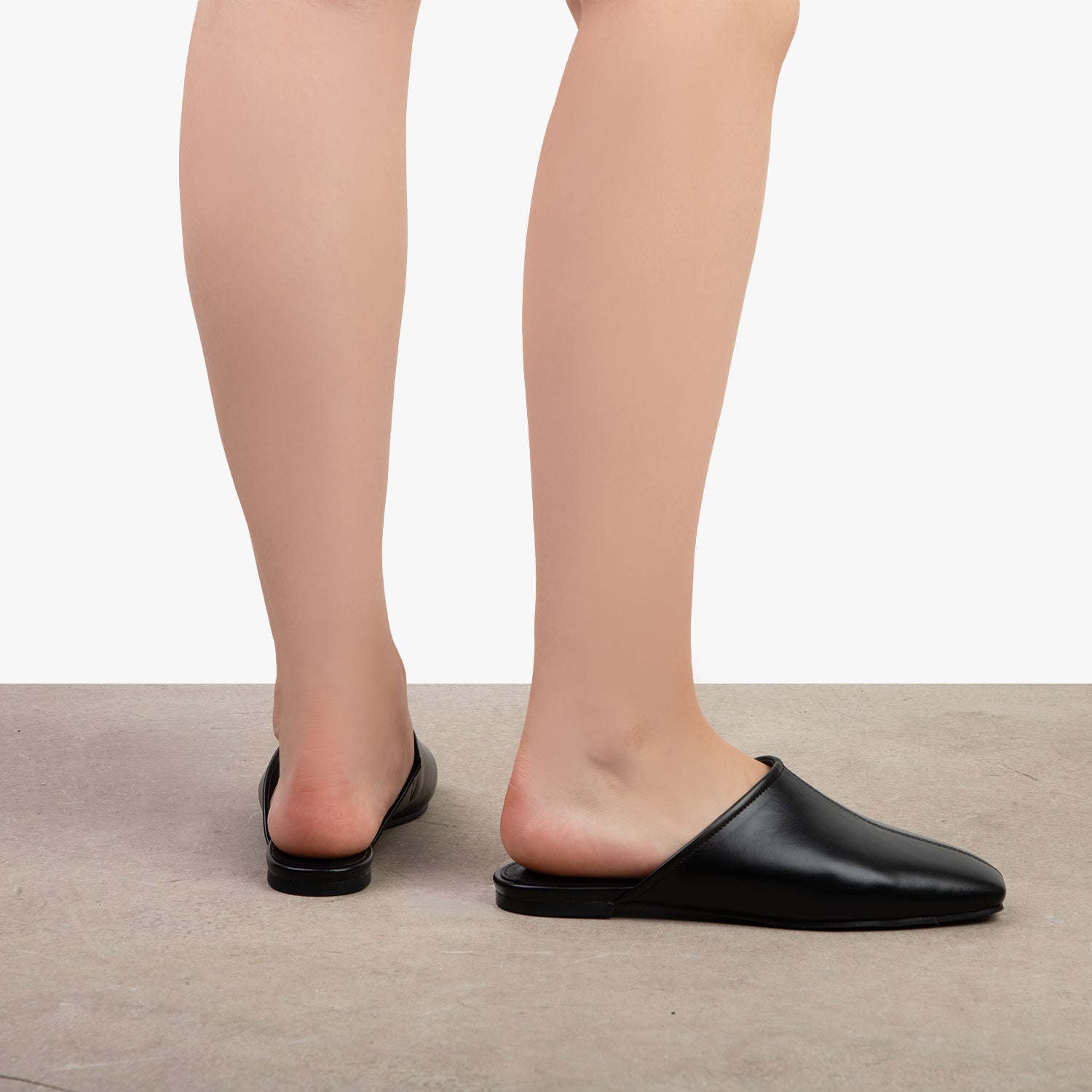 RAID Delta Slip On Mules in Black