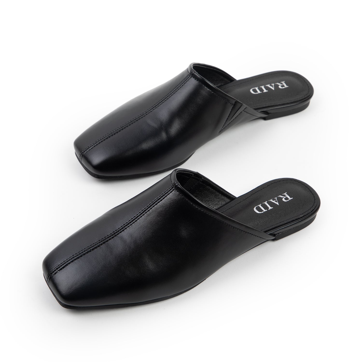 RAID Delta Slip On Mules in Black