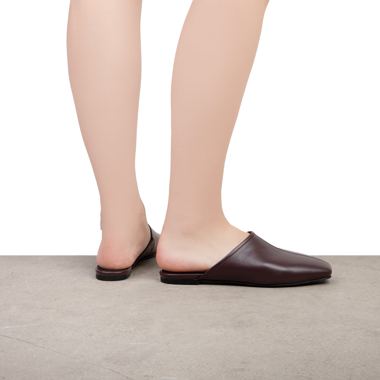 RAID Delta Slip On Mules in Brown