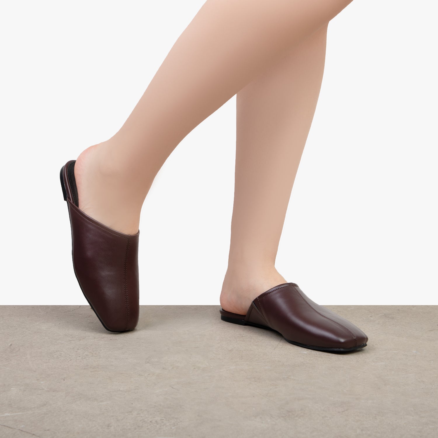 RAID Delta Slip On Mules in Brown