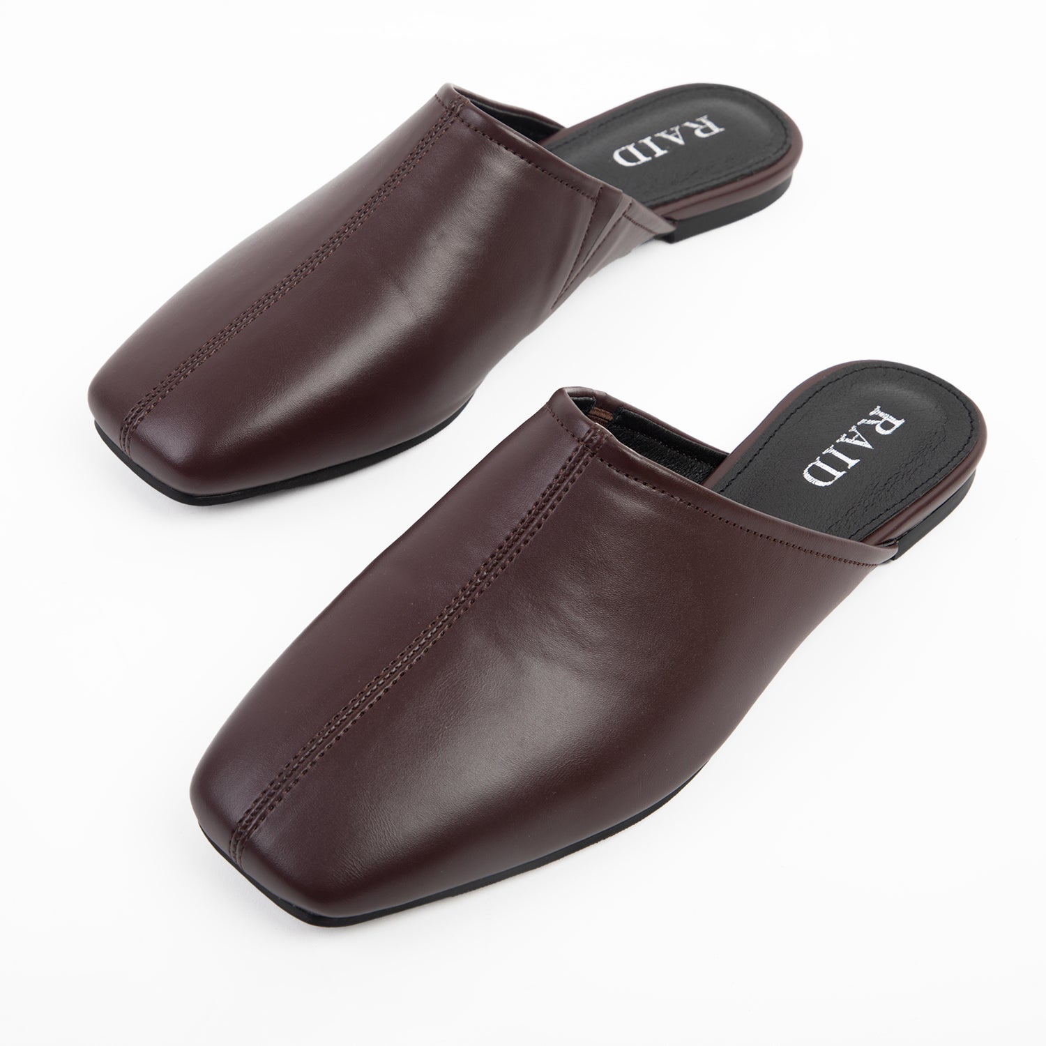 RAID Delta Slip On Mules in Brown