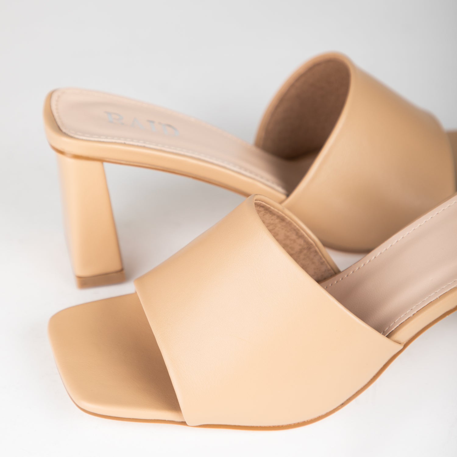 RAID Ilaria Block Heeled Mules in Nude