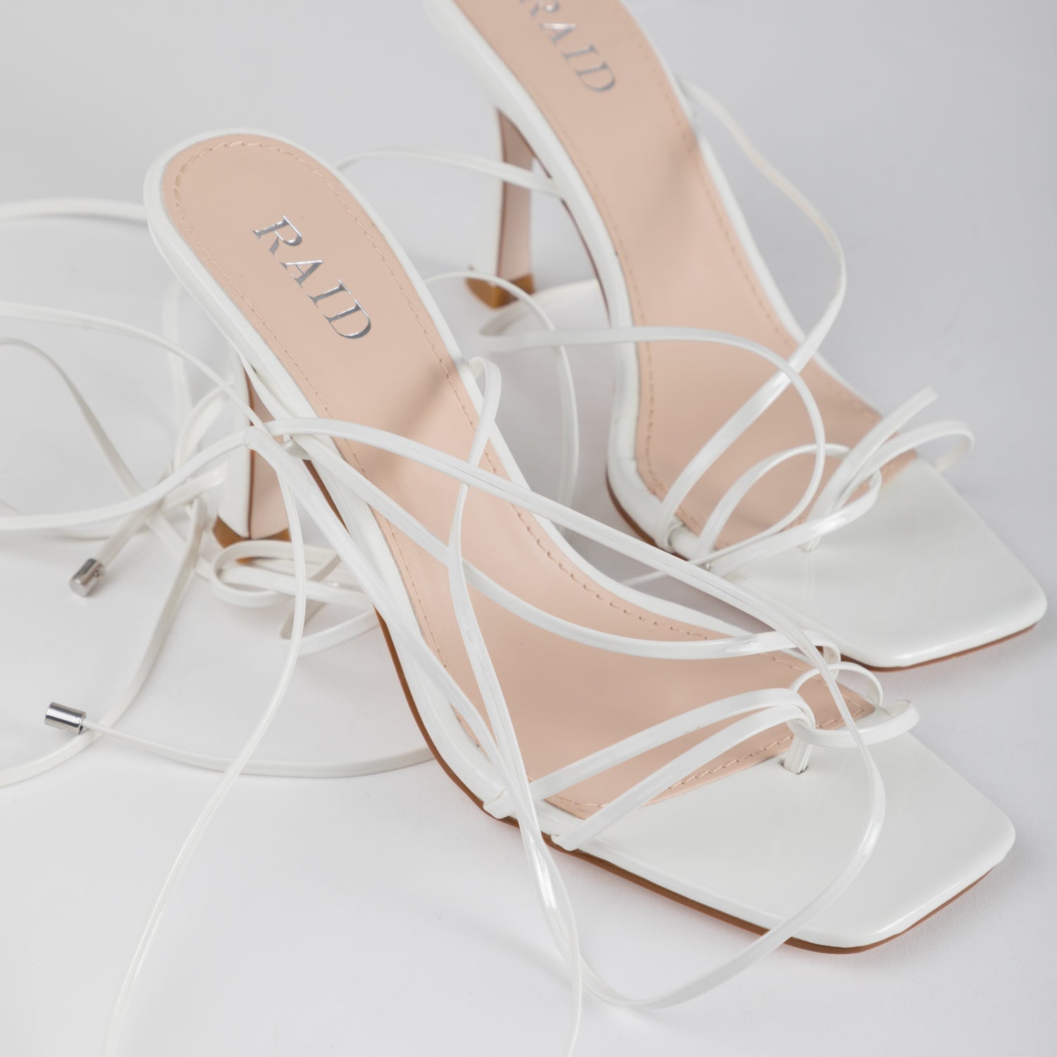 RAID Fane Lace-up Heeled Sandal in White Patent