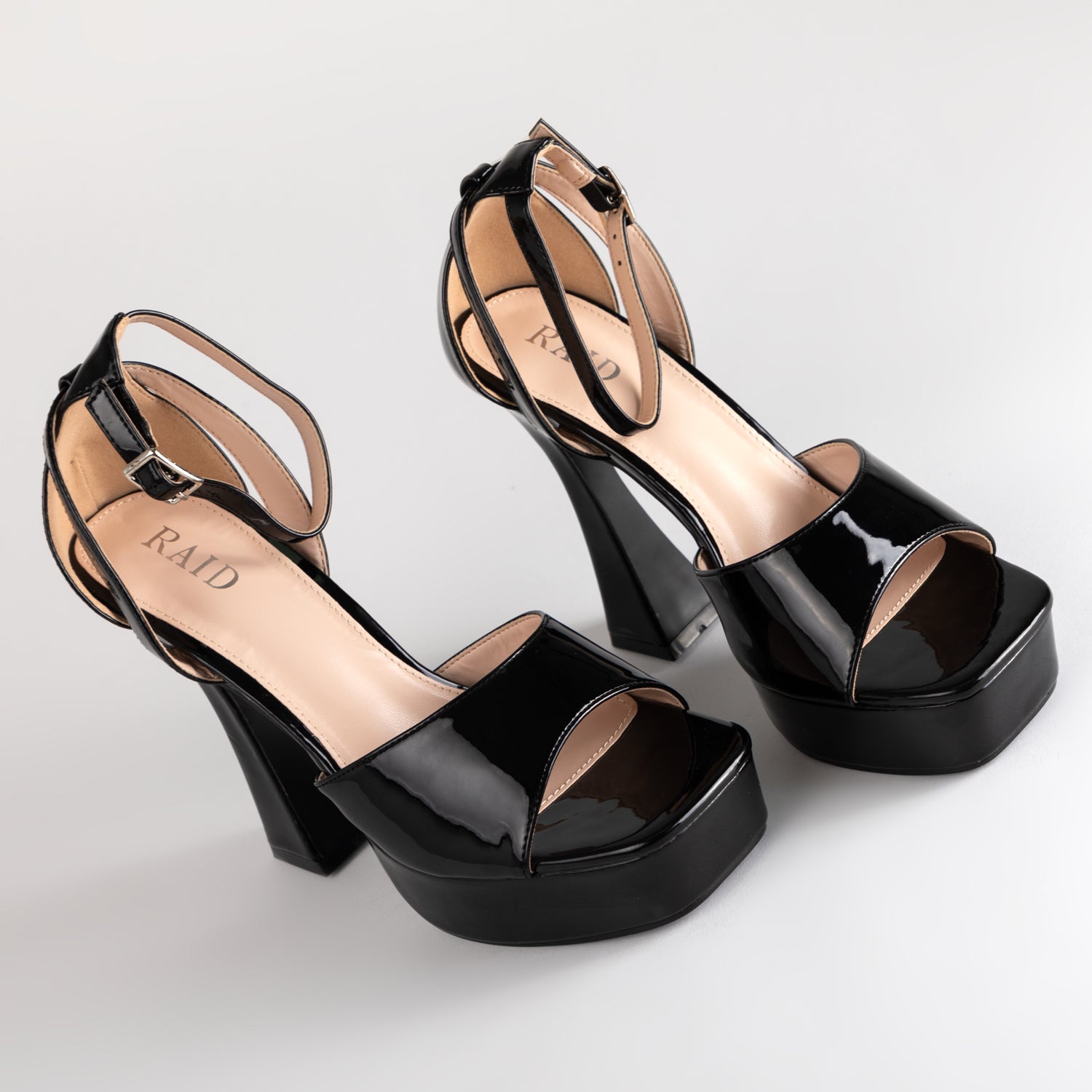 RAID Hope Platform Heels in Black Patent