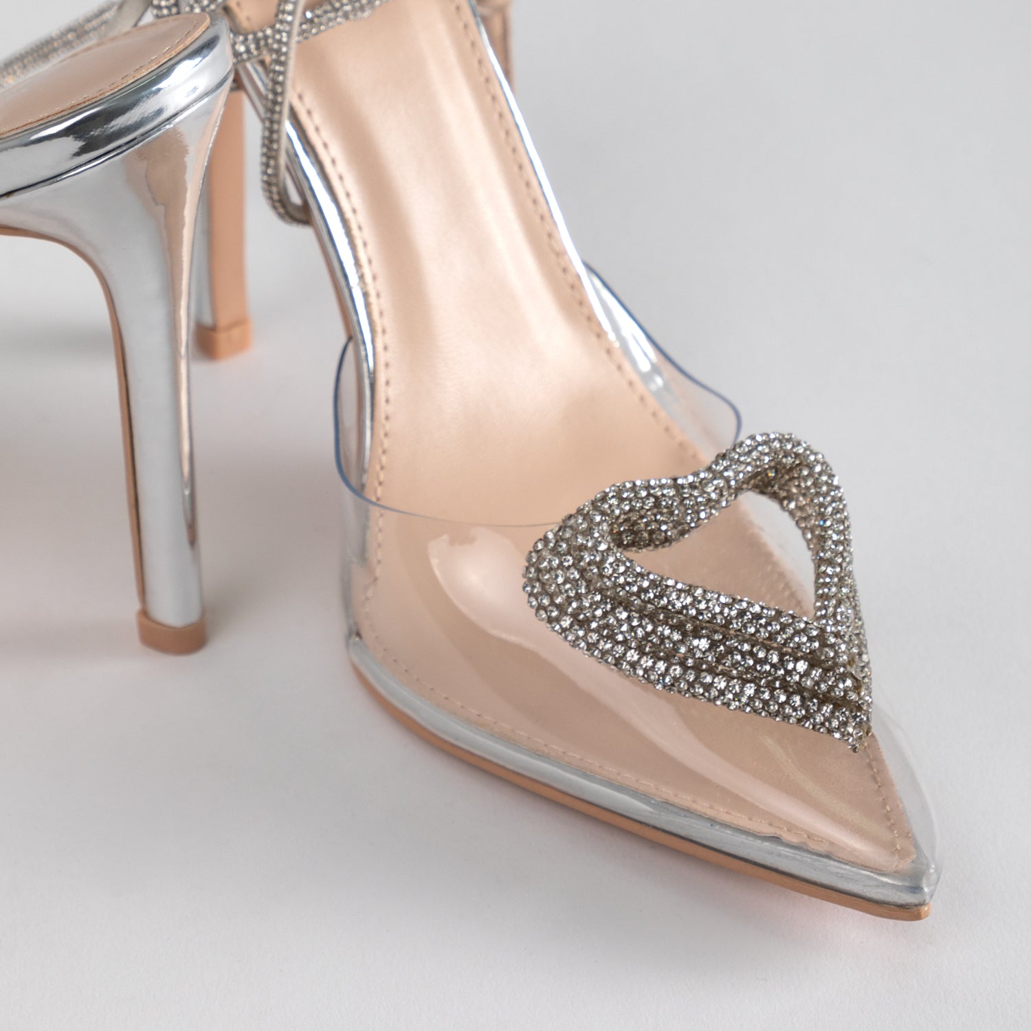 RAID Roana Stiletto Pump in Clear/ Silver Metallic